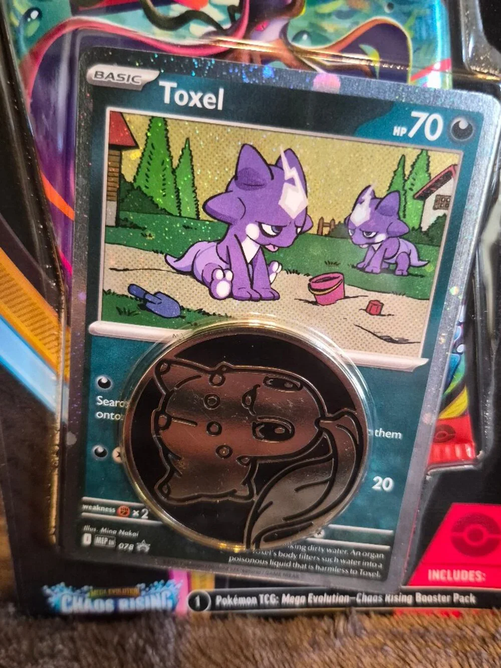 Pokémon TCG Mega Evolution—Chaos Rising 1 Booster Pack Toxel Promo Card & Coin